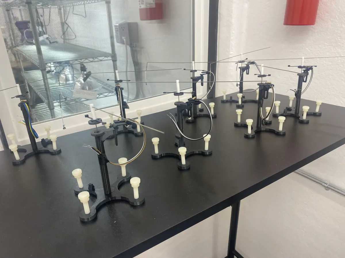 Insect flight mills on a laboratory bench