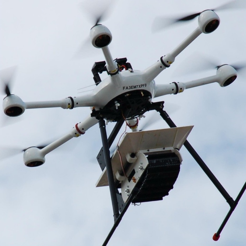 An M3 release drone in flight carrying its release unit